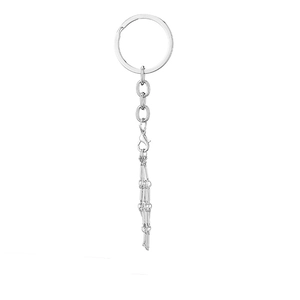 Silver metal keychain featuring a skull hand charm and lobster clasp on white background