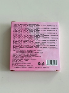 Detailed macro view of the 9-color eyeshadow palette ingredient list and safety labels