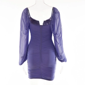 Rear view of purple bodycon dress featuring sheer mesh sleeves and ruched detail