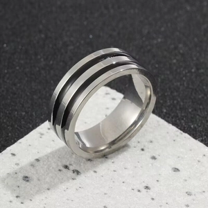 Polished titanium steel ring for men featuring triple parallel grooves and black inlay