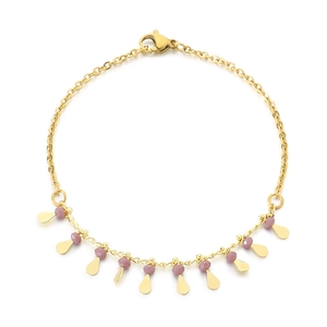 Golden fringe bracelet featuring pink beads and water drop pendants on a white background