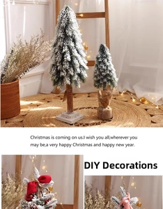 Mini snow-flocked Christmas tree with wooden base and DIY ornaments for holiday decor