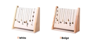 Detailed comparison of white leather and beige velvet wooden jewelry necklace stands