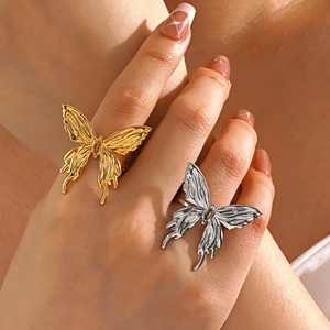Minimalist thick butterfly rings in gold and silver finish with lava texture for women