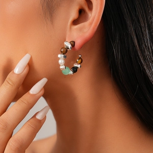 Vintage beaded C-shaped hoop earrings with tiger eye, pearls, and green gemstones