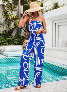 Close-up of blue abstract print bandeau top and wide-leg trousers for resort wear