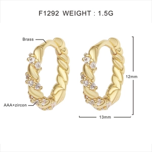 Detail view of 12mm gold-plated brass hoop earrings with AAA cubic zirconia inlays
