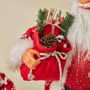 Standing Santa Claus doll decoration with red sequined sweater and rustic gift bag