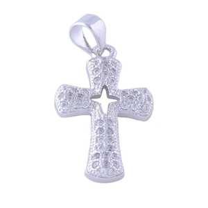 Macro detail of a silver cross pendant inlaid with sparkling cubic zirconia and center cutout