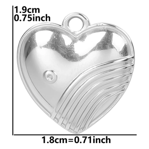 Detailed view of heart charm with ripple texture including precise size measurements