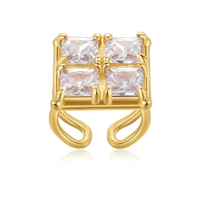 Elegant gold plated geometric ring featuring four square zircons on a white background