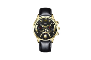 Close-up of golden chronograph watch dial with black leather strap and tachymeter scale
