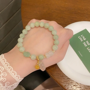 Retro chinese style green jade bead bracelet with white gourd pendant and yellow bead detail
