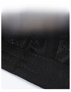 Macro shot of breathable black mesh sweatband with reinforced stitching on baseball cap