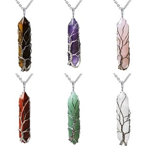 Rejilla detallada de collares de cristal con piedras hexagonales de árbol de la vida