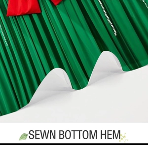 Close-up of the durable sewn bottom hem on high-quality white polyester shower curtain