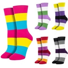 Close-up of five colorful striped crew socks sets with vivid multi-color pattern combinations