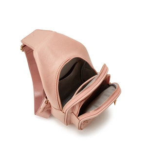 Pink leather crossbody chest bag with three zipper compartments and adjustable strap
