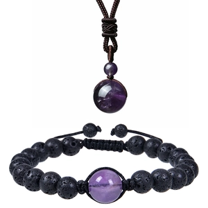 Detail of amethyst and black lava stone necklace and bracelet set with adjustable cord