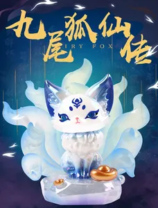 Detail of pearlescent Nine-Tailed Fox fairy figurine with blue tails and gold ingots