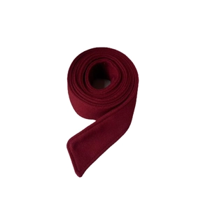 Dark red wool belt for winter coats shown in a curled pose on a white background