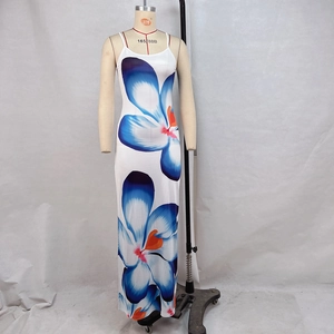 Detailed view of floral maxi dress with slim straps and large blue blossom prints