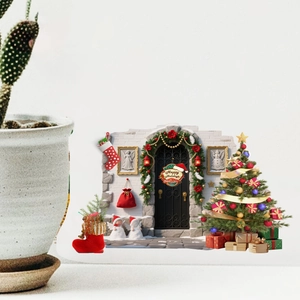 Detailed Christmas stickers including Santa, tree and gifts displayed next to a cactus plant