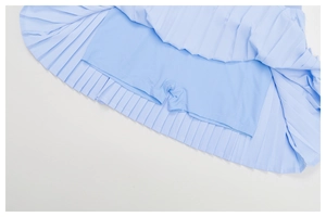 Detail view of light blue pleated tennis skirt with breathable built-in shorts lining