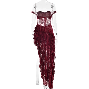 Detail of burgundy lace dress showing tiered ruffle hem and strapless corset bodice
