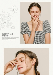 Detail view of small S925 sterling silver hoop earrings on model with elegant styling