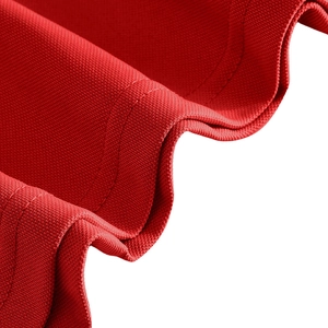 Detailed macro view of vibrant red polo shirt fabric with high-quality double stitching