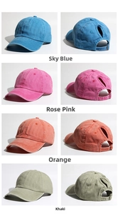 Detail of four ponytail baseball caps in turquoise, rose, orange, and khaki washed cotton