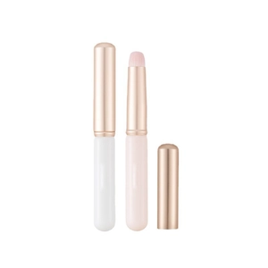 Portable mini round head lipstick brushes in pink and white with golden metal caps