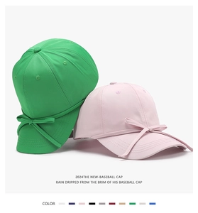 Detail of soft top baseball caps with decorative bows and quick-dry fabric in multi colors