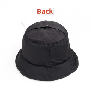 Detail view of the padded reverse side of a warm black winter foldable bucket hat