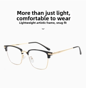 Close-up of semi-rimless glasses frame featuring stylish black and gold metallic temples