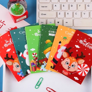 Set di 6 mini taccuini natalizi colorati con motivi a cartone di Babbo Natale e renne