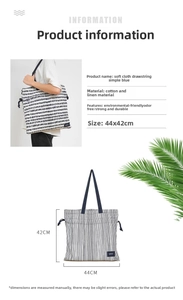 Detail showing 44x42cm dimensions of the black and white canvas drawstring tote bag