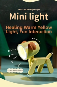 Detail of cute yellow puppy mini LED night light with adjustable joints and warm glow
