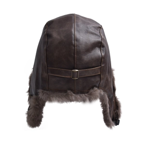Detail view of winter pilot hat with faux leather texture and adjustable back buckle