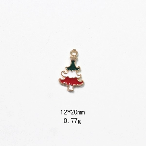 Detailed macro view of a 12x20mm enamel Christmas tree pendant for DIY jewelry