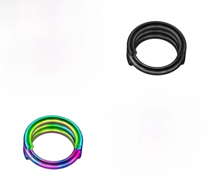 Detail of triple-layered steel piercing ring in black and iridescent plated finishes