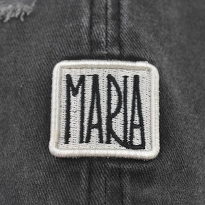 Distressed dark grey cotton baseball cap with MARIA letter embroidery patch detail