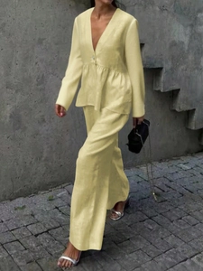 Women's chic beige V-neck long sleeve top with ruffles and wide leg trousers set