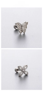 Detailed close-up of silver bow and clover stud earrings with sparkling cubic zirconia