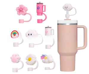 Close-up of silicone straw covers in cute flower and cloud shapes for 10mm tumblers