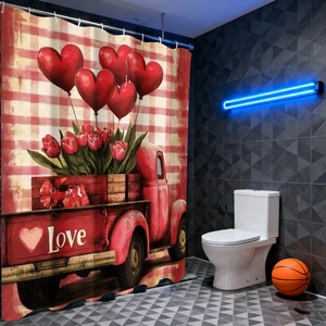Detail view of Valentine shower curtain with vintage red truck and heart balloons