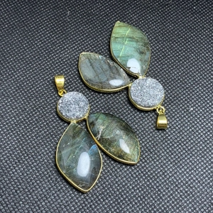 Leaf-shaped labradorite pendants with golden plating and grey druzy stone accents