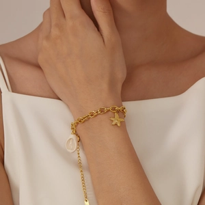 Golden starfish and shell charm bracelet for women with chunky chain design