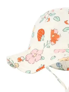 Close-up of cotton baby sun hat with floral and strawberry print and drawstring detail